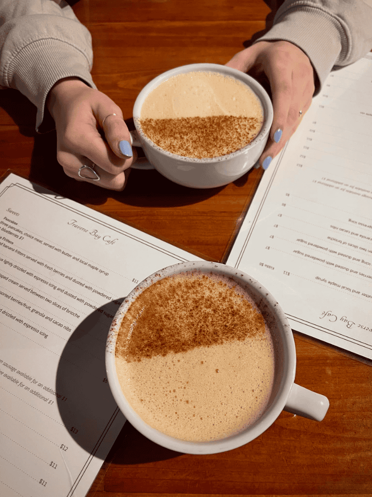 Steaming lattes in a cozy café, perfect for relaxing and enjoying quality time.