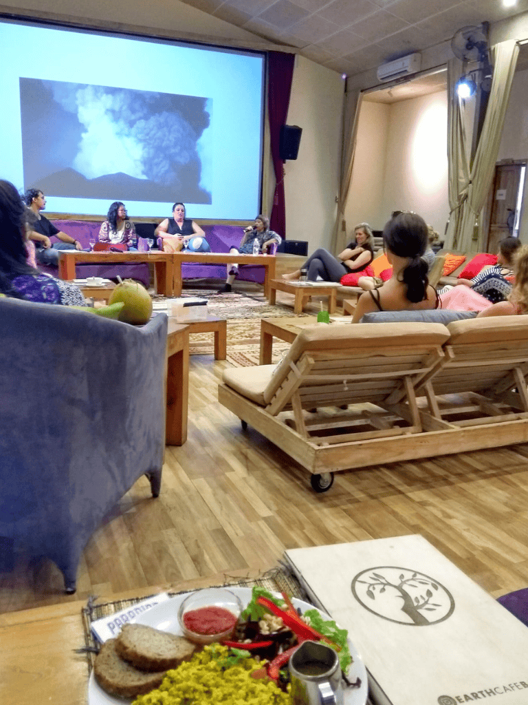 Storm eruption volcano documentary, outdoor recreational activities, group discussion, community event, educational presentation, natural disaster awareness, environmental education, learning about volcanoes.