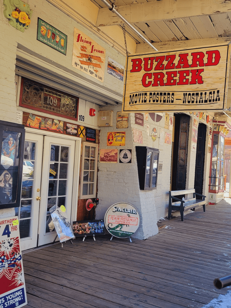 Vintage Buzzard Creek memorabilia with nostalgic movie posters at QuestForDirections.