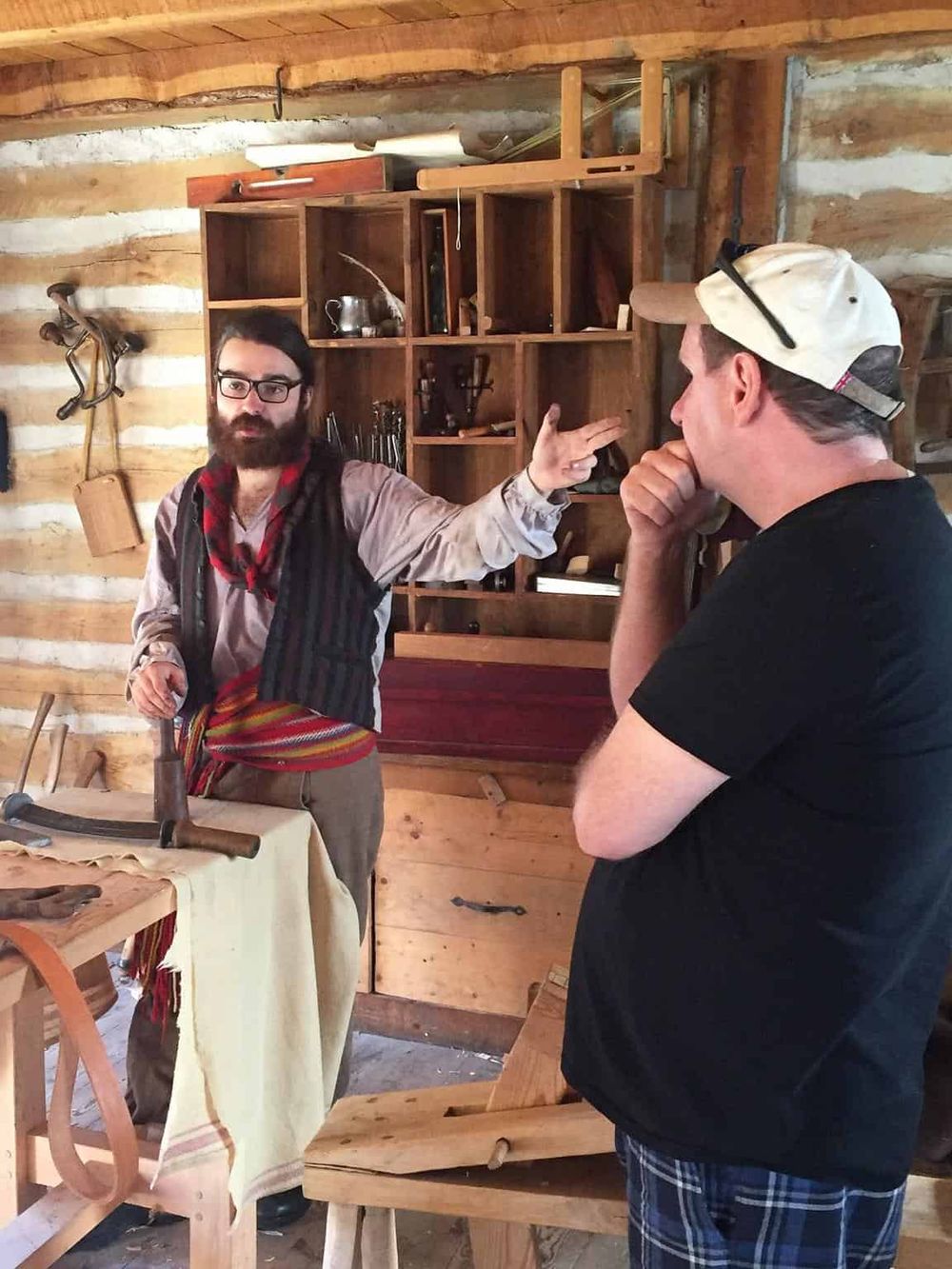 Traditional woodworking skills demonstration at QuestForDirections, showcasing hand tools and craftsmanship.