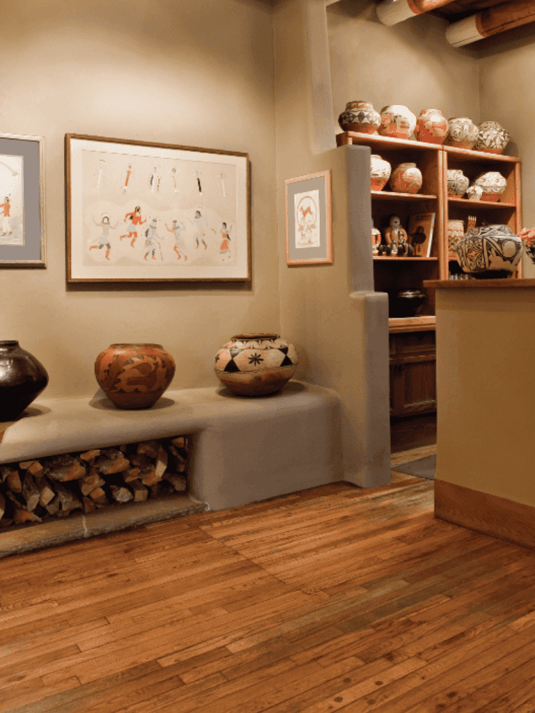 Clay pottery and decorative vases display in cozy home interior for art and craft enthusiasts.