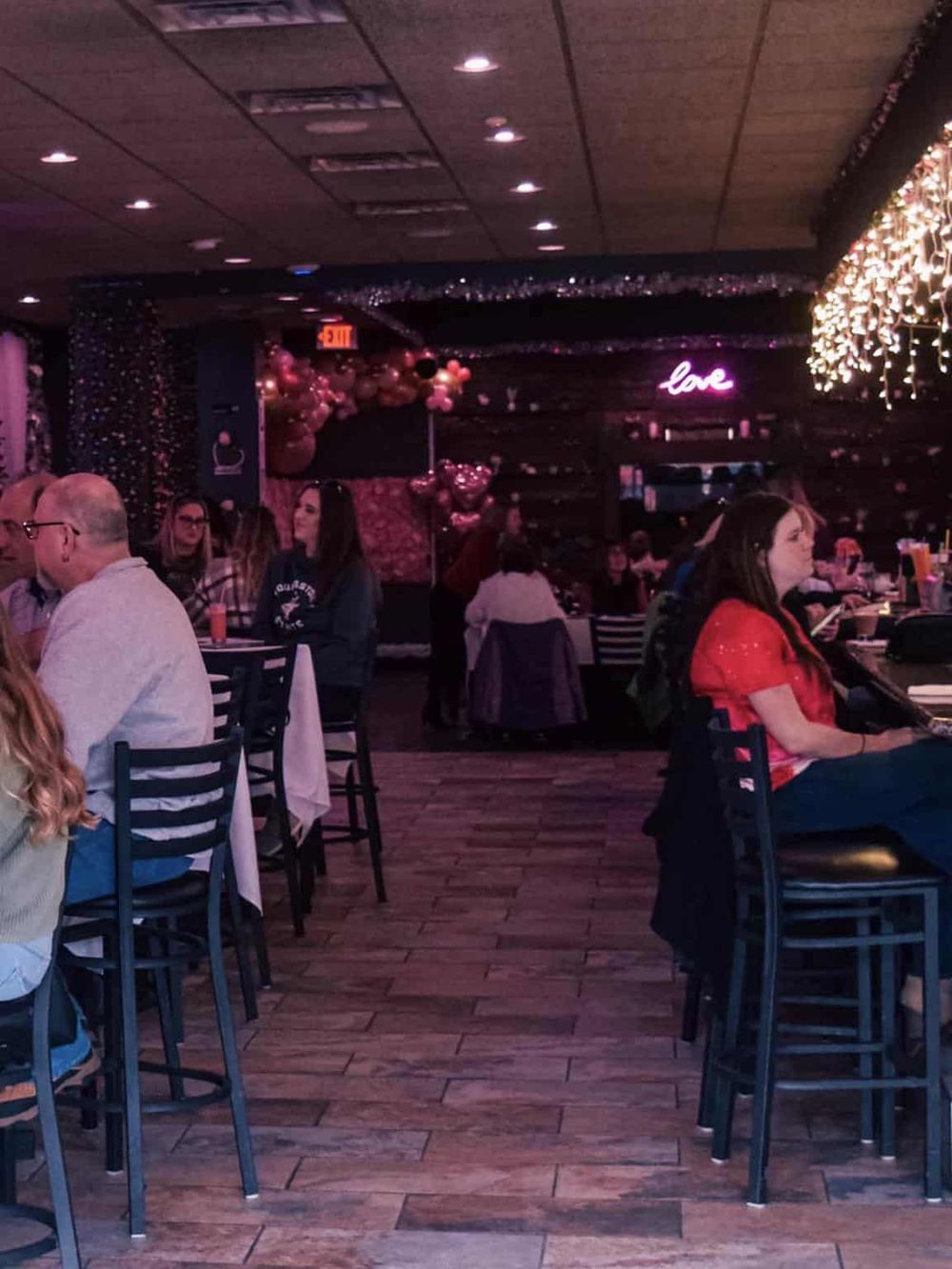 Colorful restaurant interior with romantic lighting and decor, perfect for exploring date night ideas.
