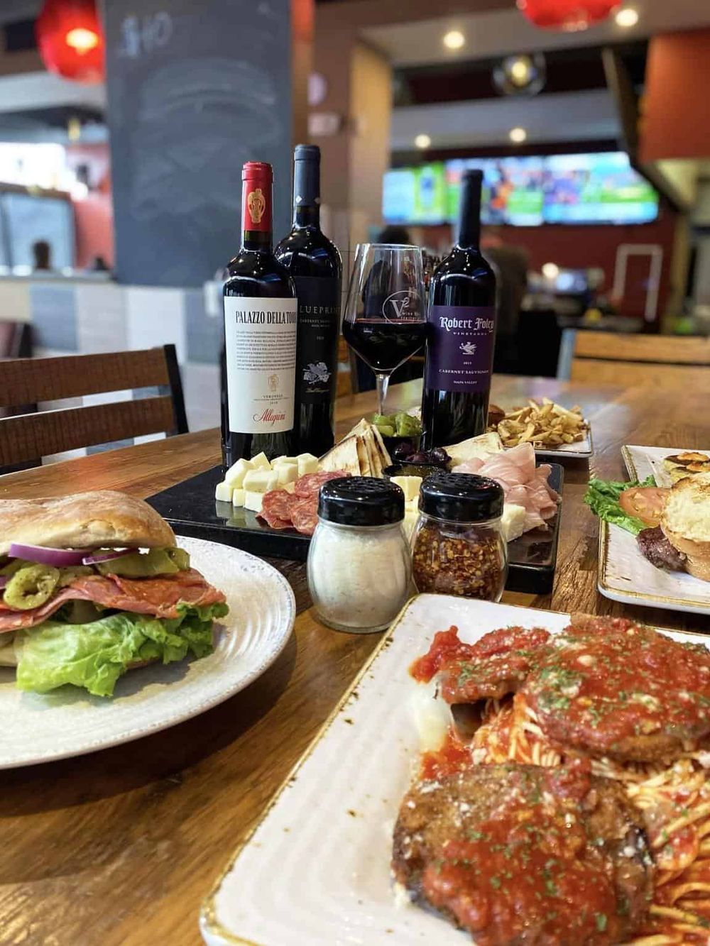 Elegant Italian wine and delicious pasta served at a cozy restaurant, perfect for a dining experience near QuestForDirections.