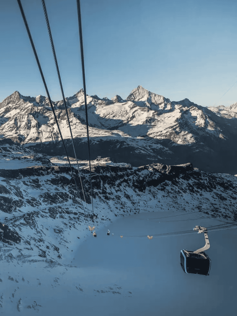 Snow-capped mountain landscape with ski lift, adventuring in the mountains, scenic winter outdoor activity, QuestForDirections.