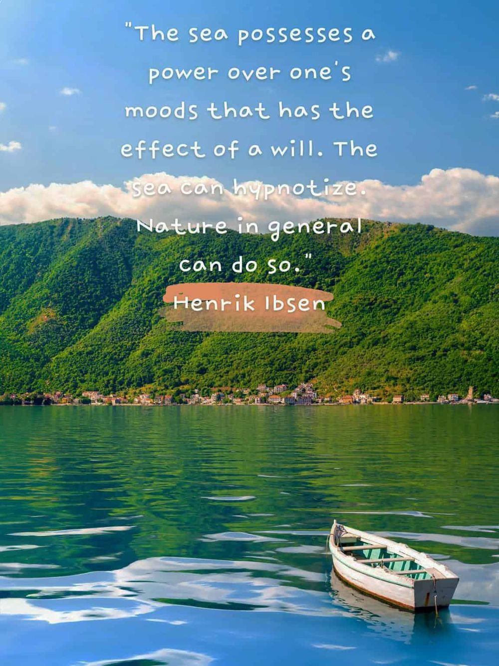 A boat floating on calm sea with lush green mountains and quote about the sea's power.
