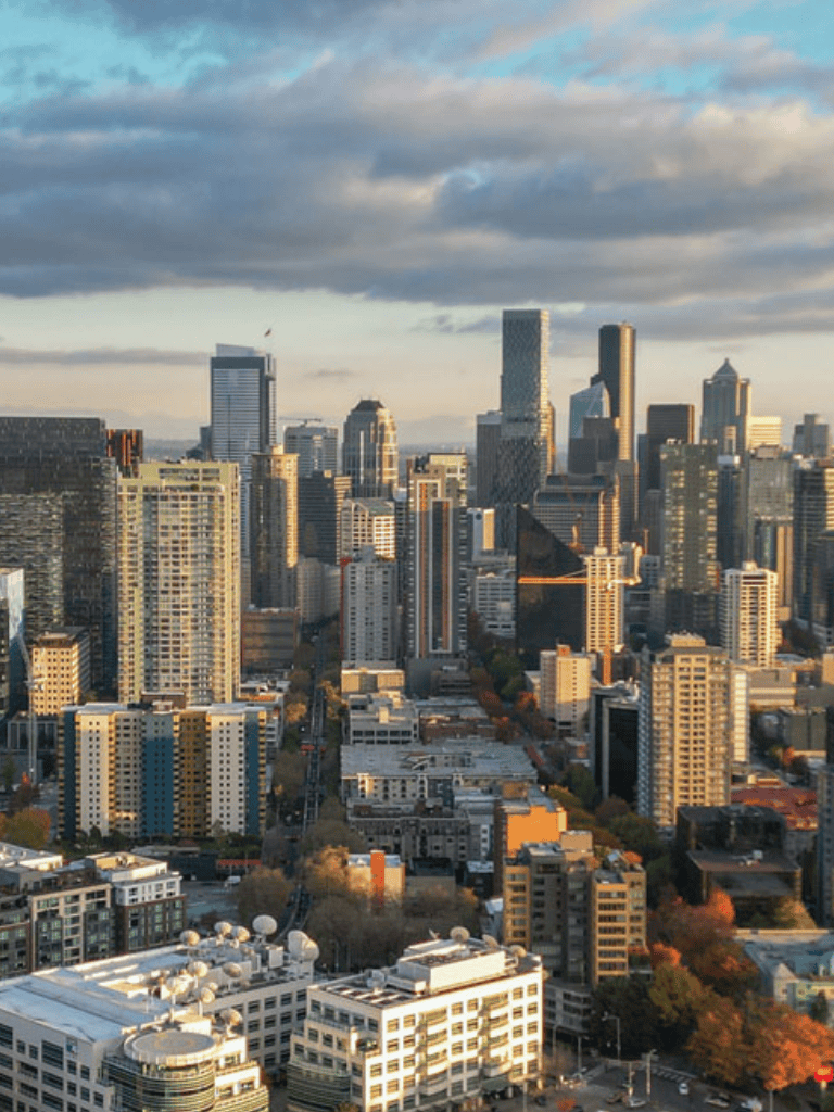 Modern downtown skyscraper city skyline at sunset, urban environment, tall buildings, cityscape, QuestForDirections.