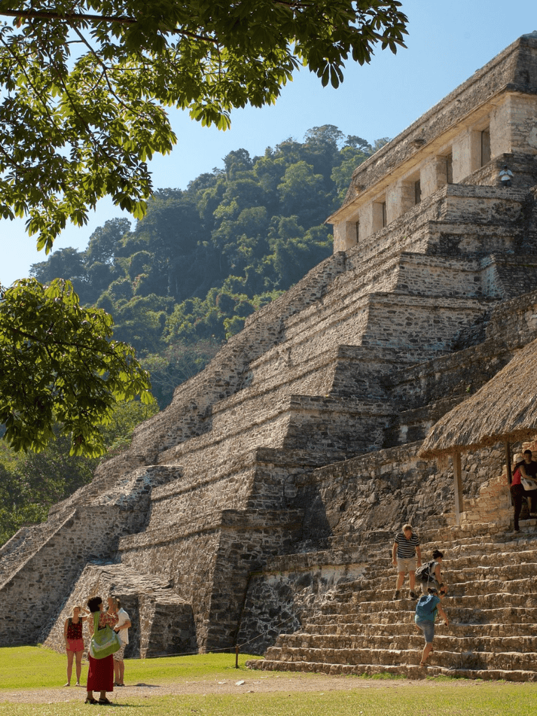 Ancient Mayan pyramid at Tikal archaeological site, Guatemala, lush jungle backdrop.