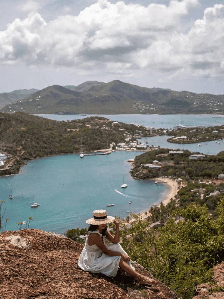 Breathtaking harbor view with islands, boats, and mountains, perfect for travel destinations.