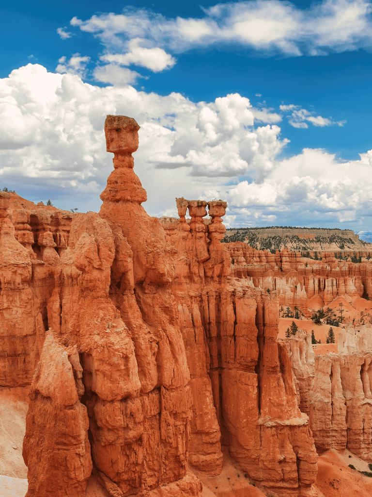 Vivid Bryce Canyon hoodoos with dramatic sky, iconic natural rock formations, Southern Utah scenic landscape, Utah national park.