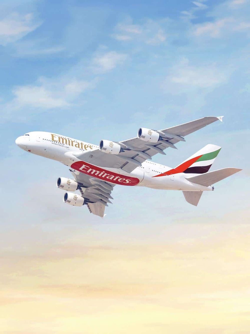Modern Emirates airplane flying through the sky, promoting travel and aviation services.