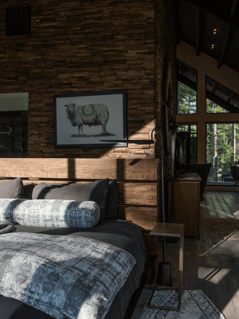 1. Modern rustic bedroom with natural wood accents and mountain views.