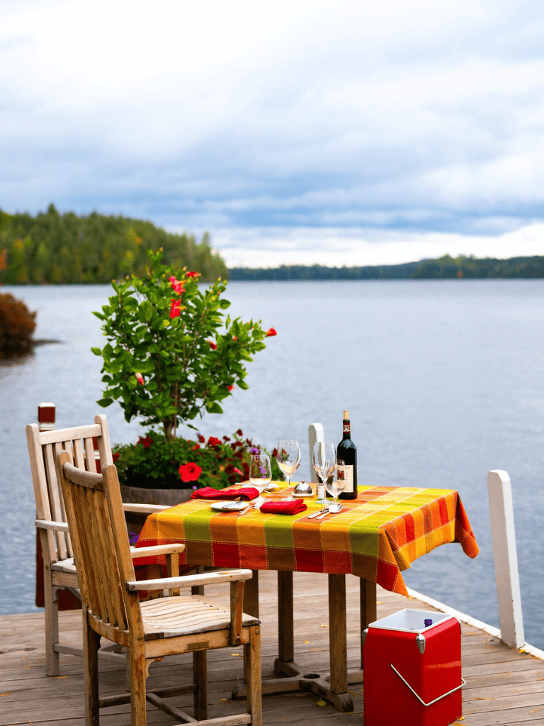 Relaxing lakeside dining with beautiful outdoor scenery and vibrant table setting.