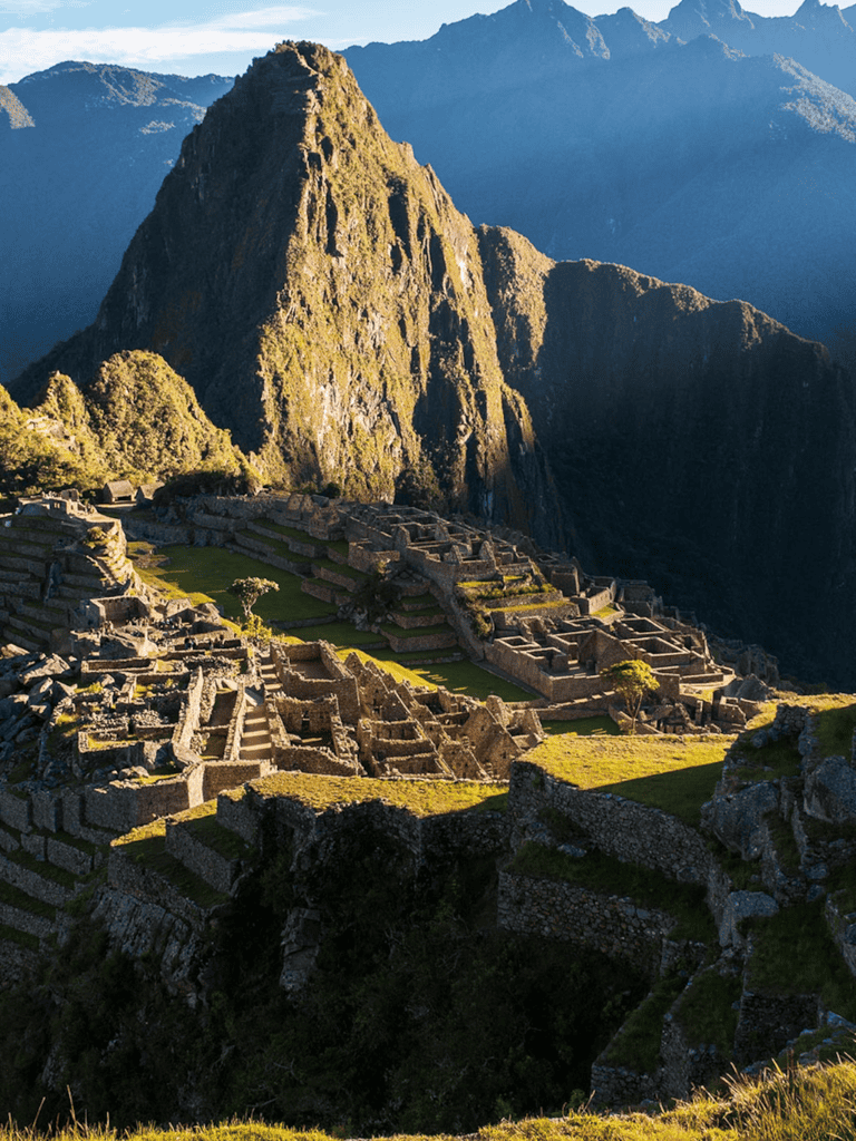 Ancient Machu Picchu ruins nestled in lush mountains, a must-see Inca archaeological site in Peru.