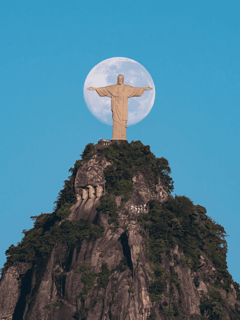 Jesus Christ Statue on Corcovado Mountain in Rio de Janeiro, Brazil, at night.