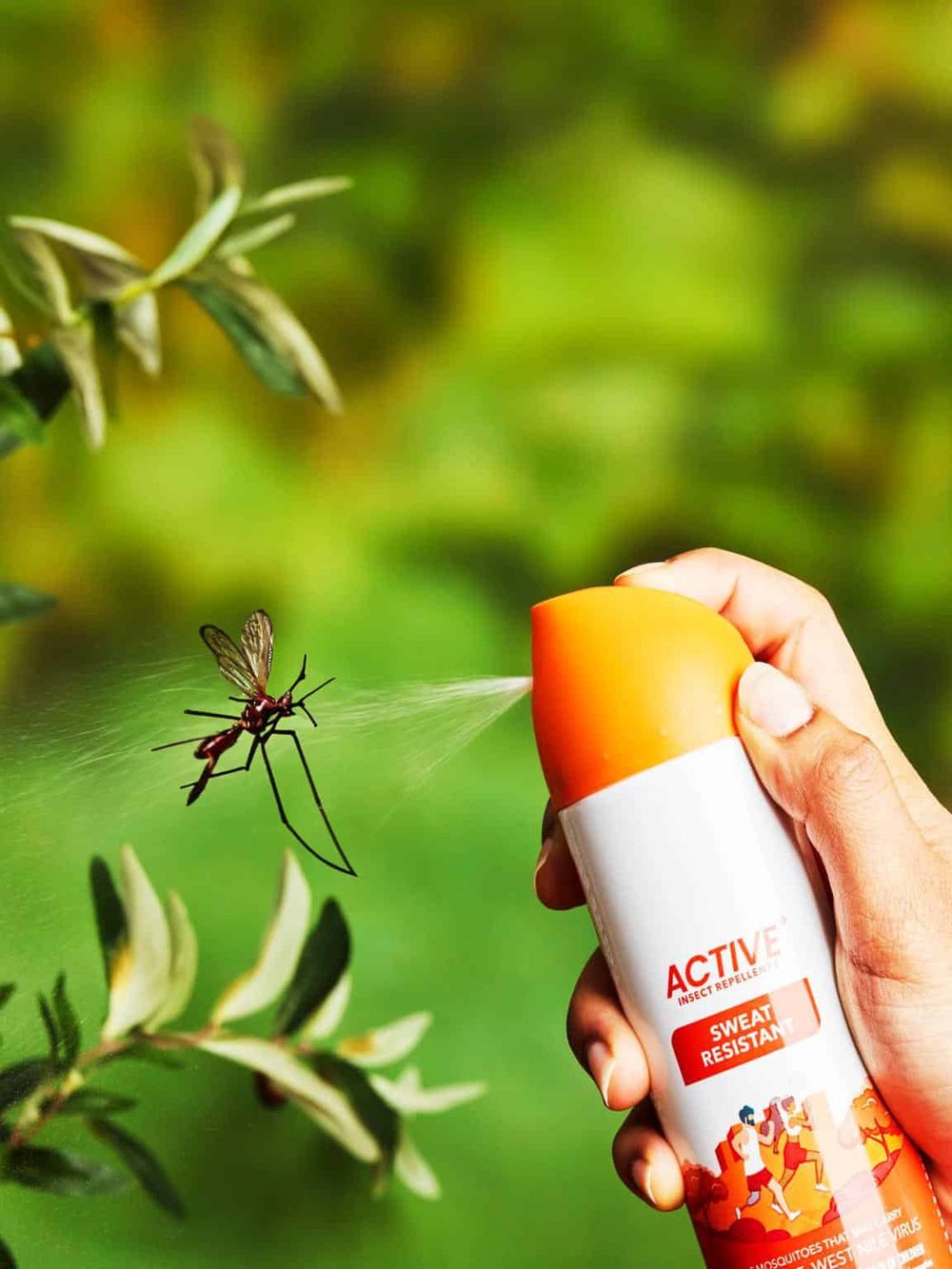 Mosquito repellent spray being used outdoors for insect protection and pest control.