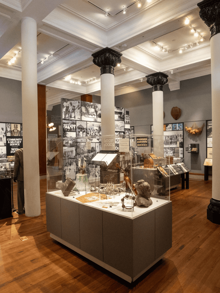 Historical exhibit showcasing artifacts, photographs, and memorabilia at QuestForDirections museum.