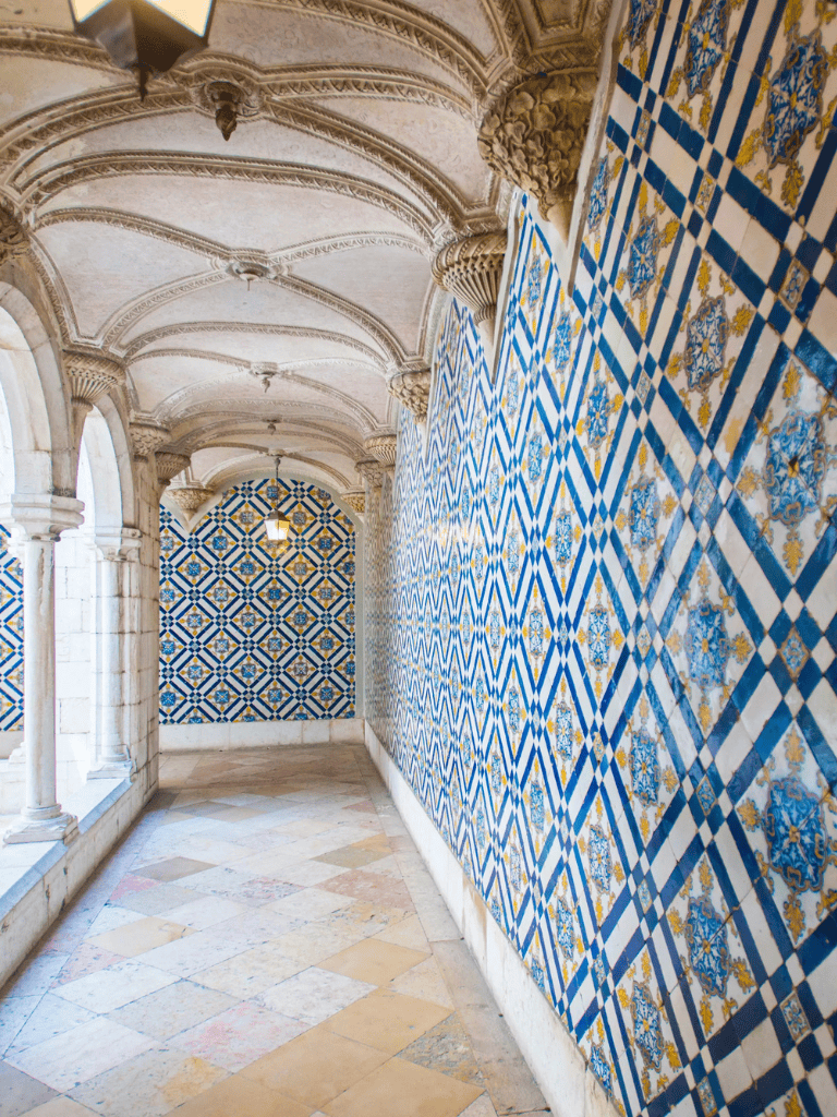 Colorful tiled corridor at Quest For Directions historic site.