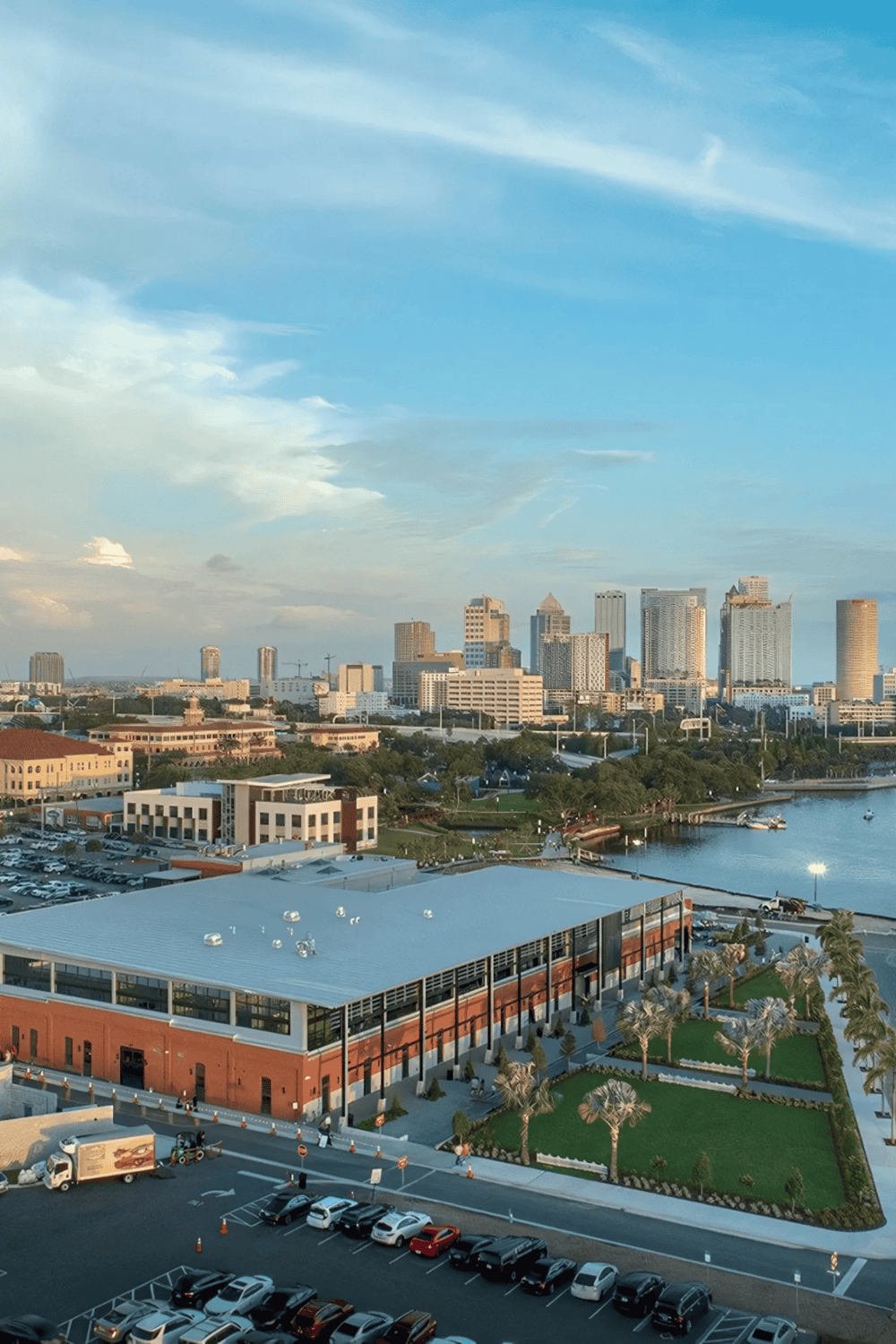 Modern city skyline with waterfront and urban park, showcasing skyline, cityscape, waterfront views, and downtown architecture.