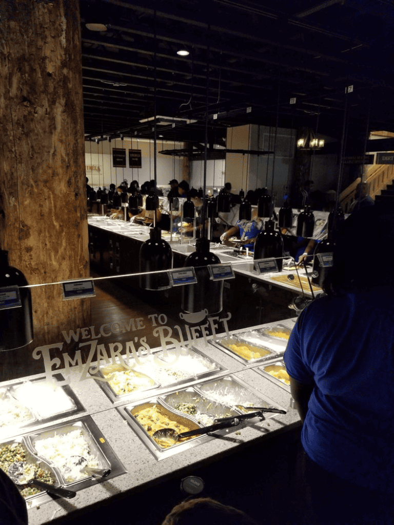 Hearty buffet meals at Emzara’s Buffet restaurant, featuring a variety of dishes in a lively dining atmosphere.