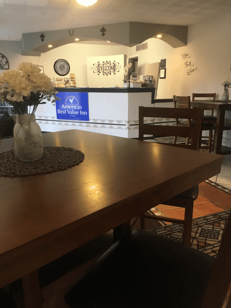 Cozy hotel lobby with reception desk and welcoming decor at QuestForDirections Inn.