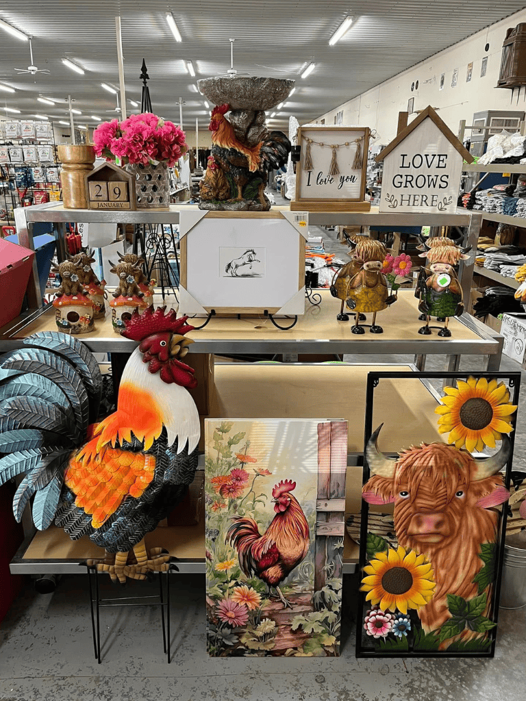 Colorful home decor and garden ornaments display at QuestForDirections store.