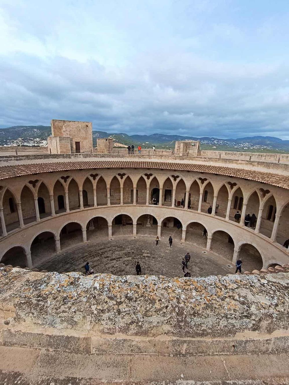 Ancient Roman amphitheater showcasing historic architecture and cultural landmarks.