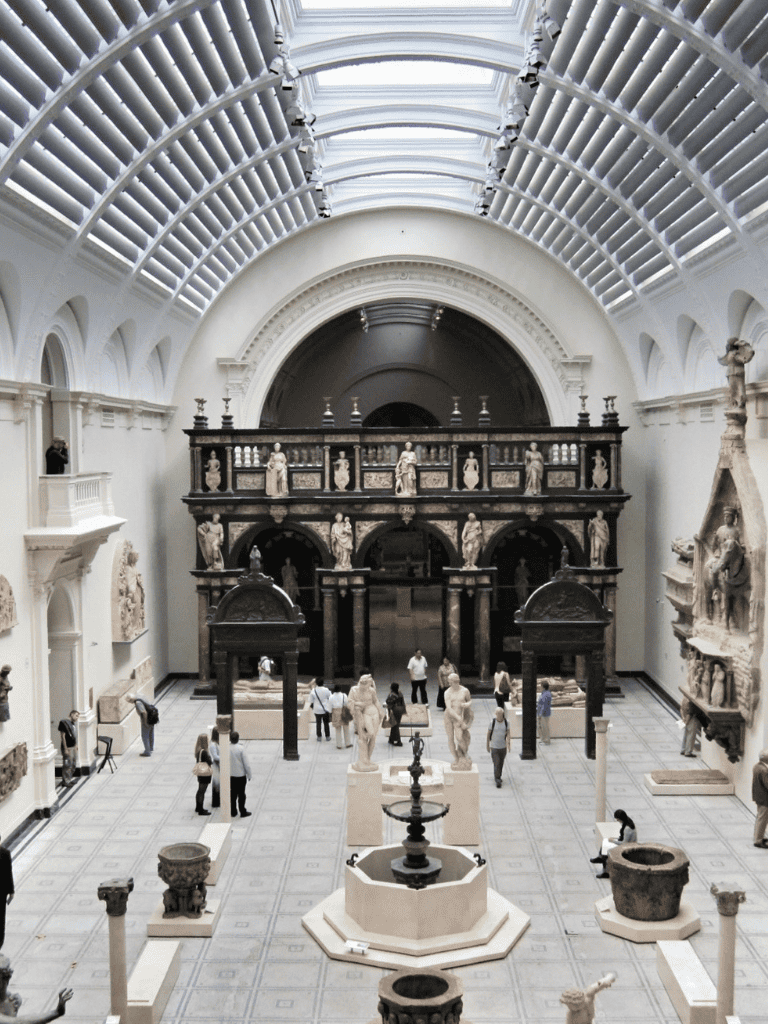 Intricate marble sculptures and classical art at Quest for Directions museum exhibit.