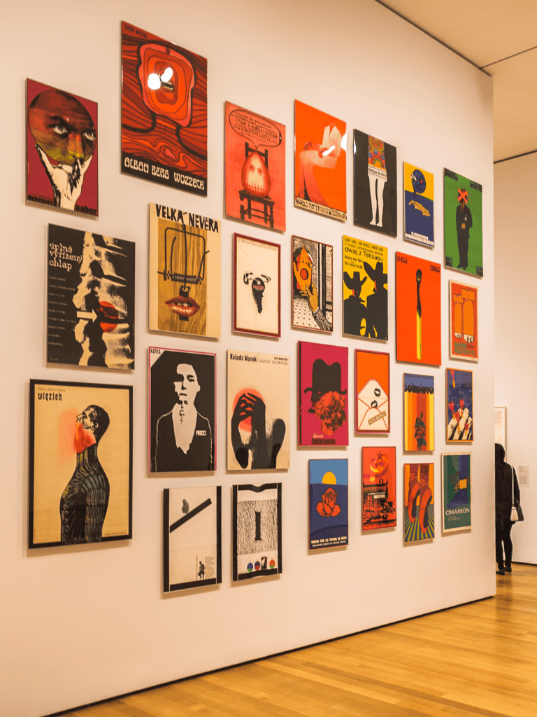 Colorful modern artwork displayed on gallery wall at QuestForDirections art exhibit.