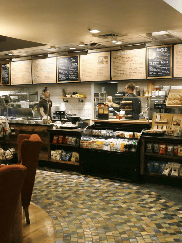 Fresh cafe interior with menu display and coffee counter at QuestForDirections.