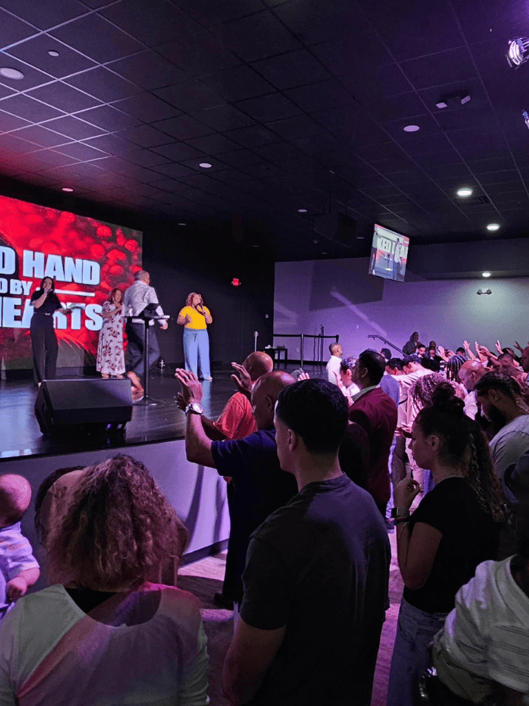 Praise and worship event at Quest for Directions community center.