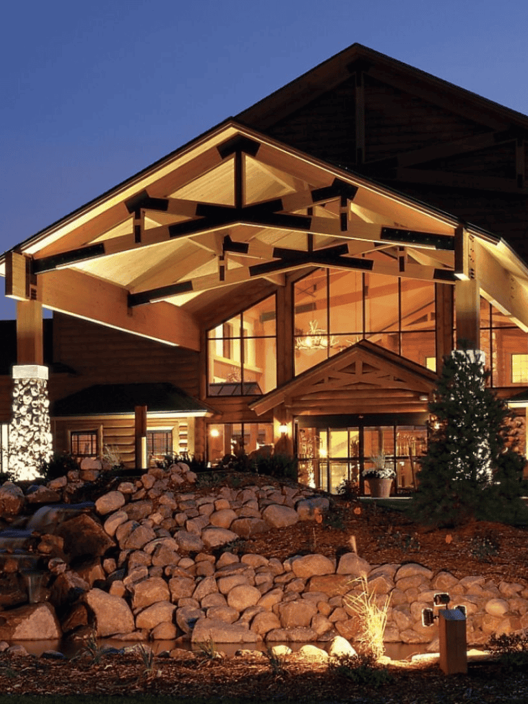 Luxury mountain lodge with modern architecture and scenic landscape, perfect for retreats or vacations.