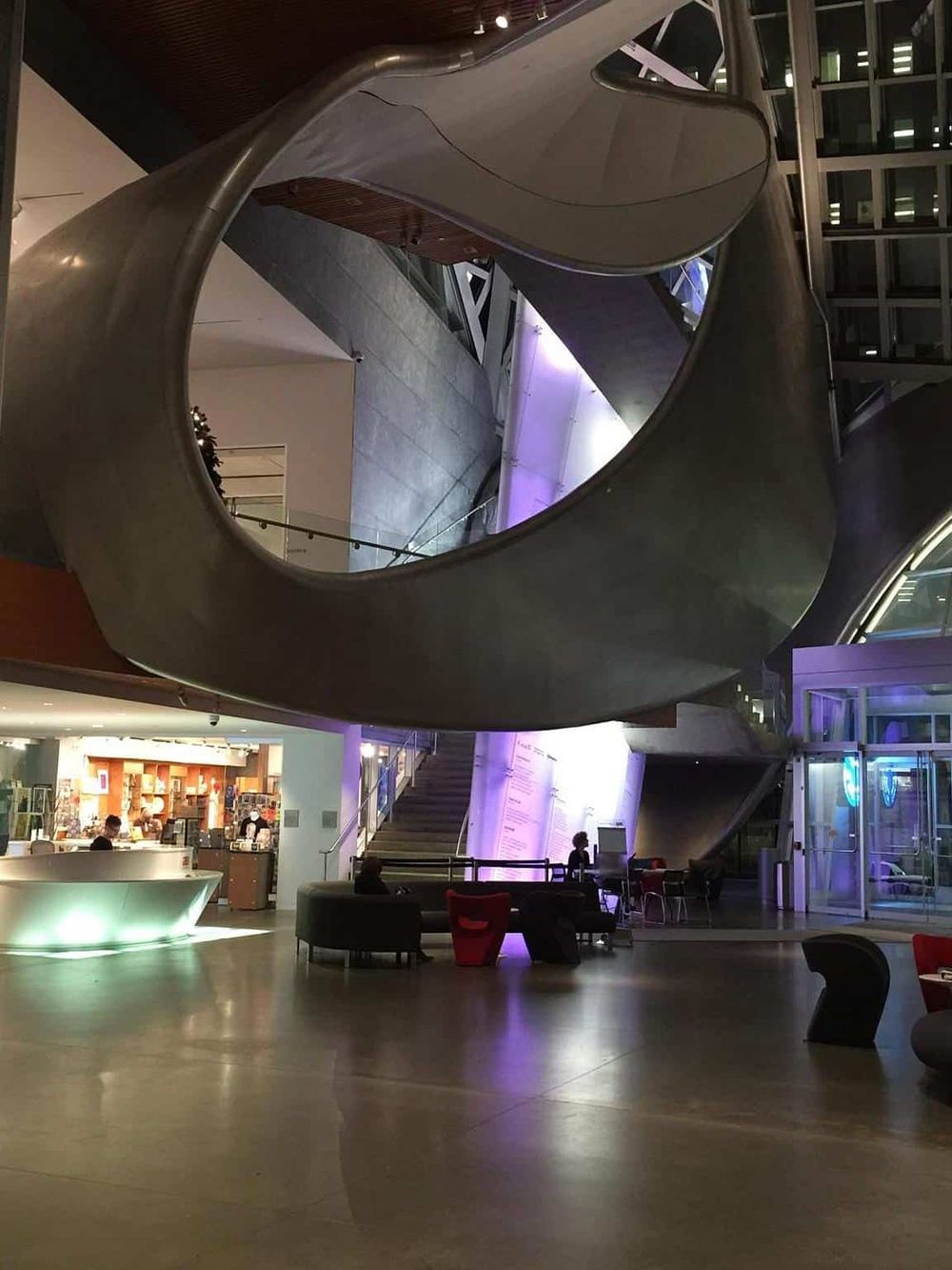 Elegant modern staircase at QuestForDirections headquarters, highlighting innovative architecture and interior design.