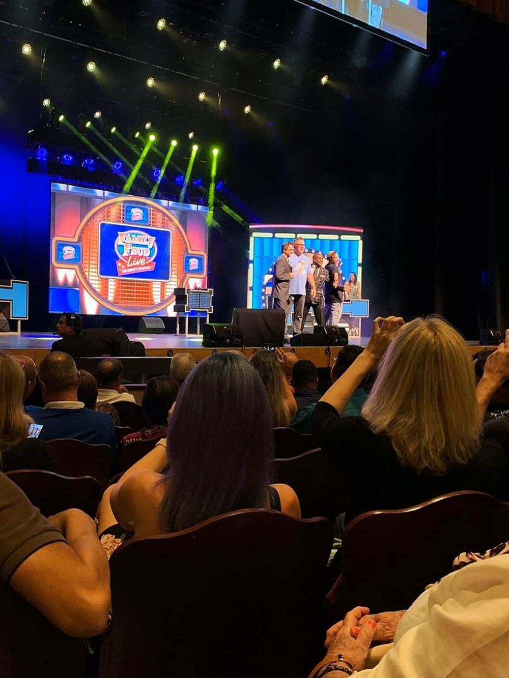 Engaging conference event at QuestForDirections, showcasing expert speakers and professional presentations on stage.