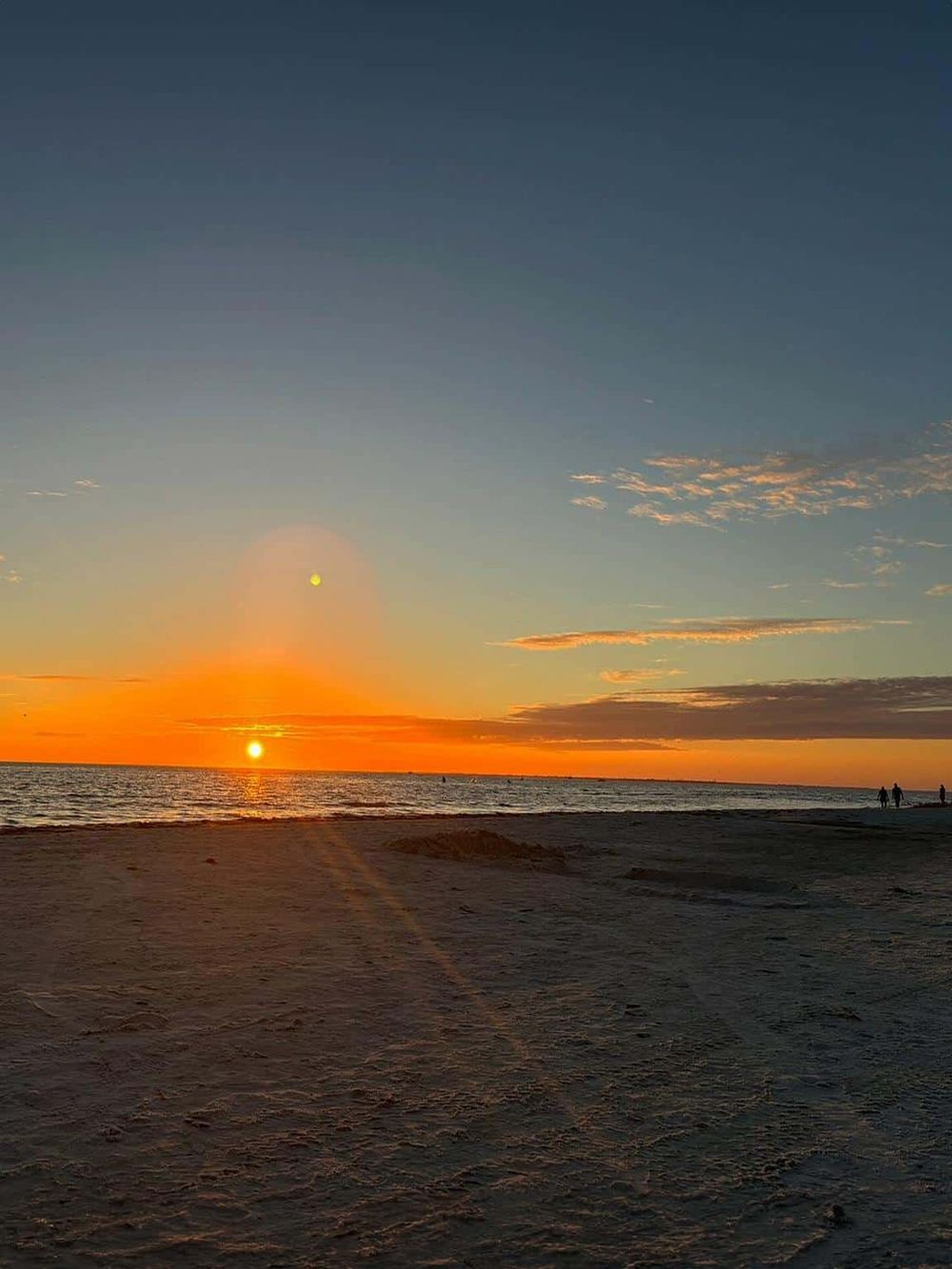 Stunning sunset over the beach, perfect for travel and vacation destinations.