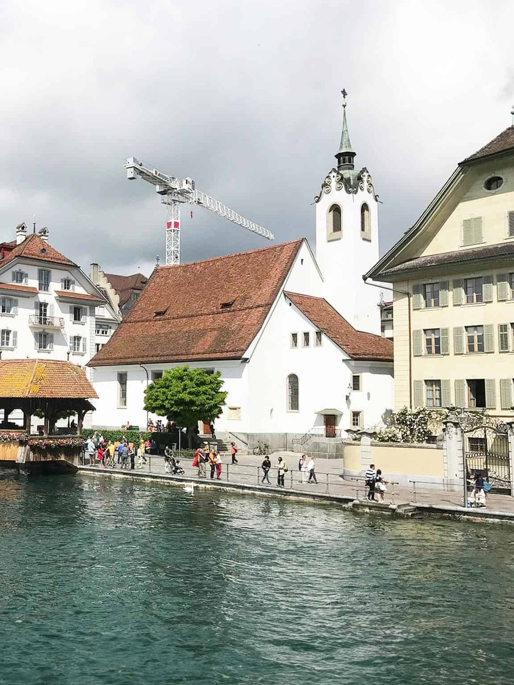 Charming lakeside village with historic church and scenic cityscape, perfect for travel and exploration.