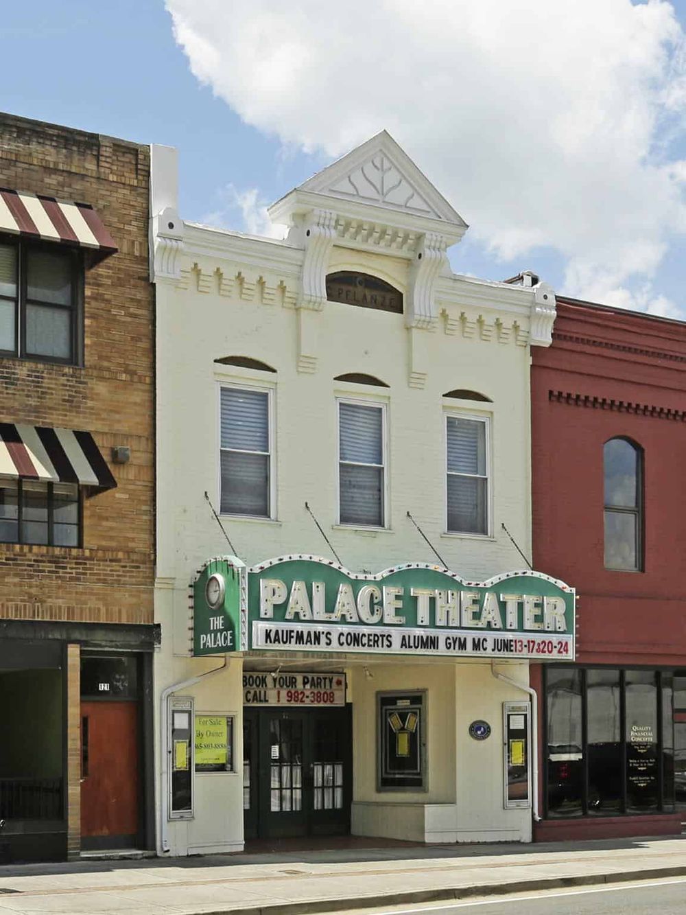 Historic Palace Theater building with marquee signage for concerts and events in Downtown.
