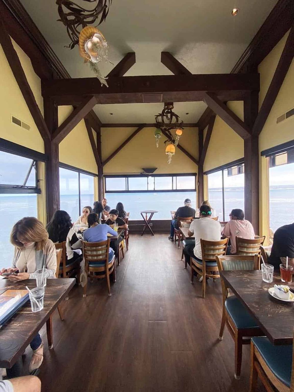 Coastal restaurant with ocean views, casual dining, and scenic water scenery, perfect for relaxing meals.