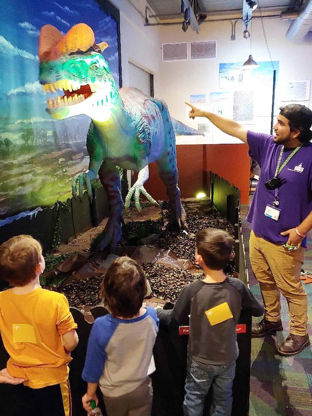 Colorful dinosaur exhibit at QuestForDirections, engaging children with educational and interactive experiences.