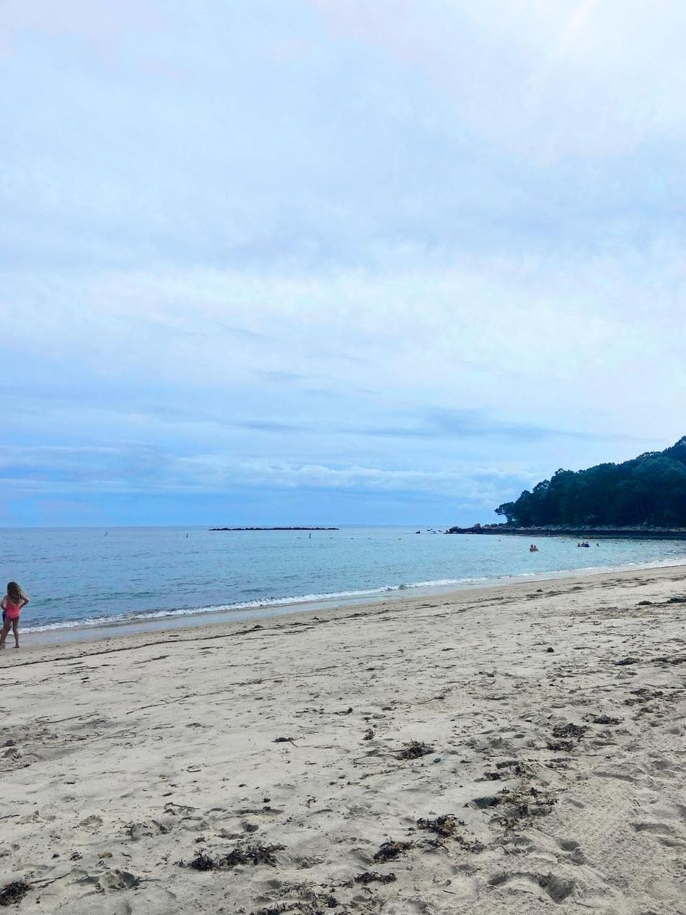 Relaxing beach scene with sandy shores and ocean views, perfect for beach vacations and coastal adventures.