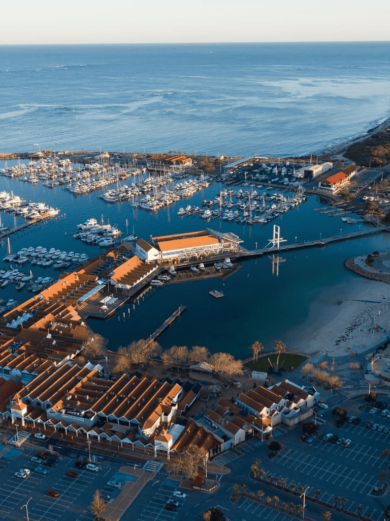 Marina and coastal area with boats and sea views.