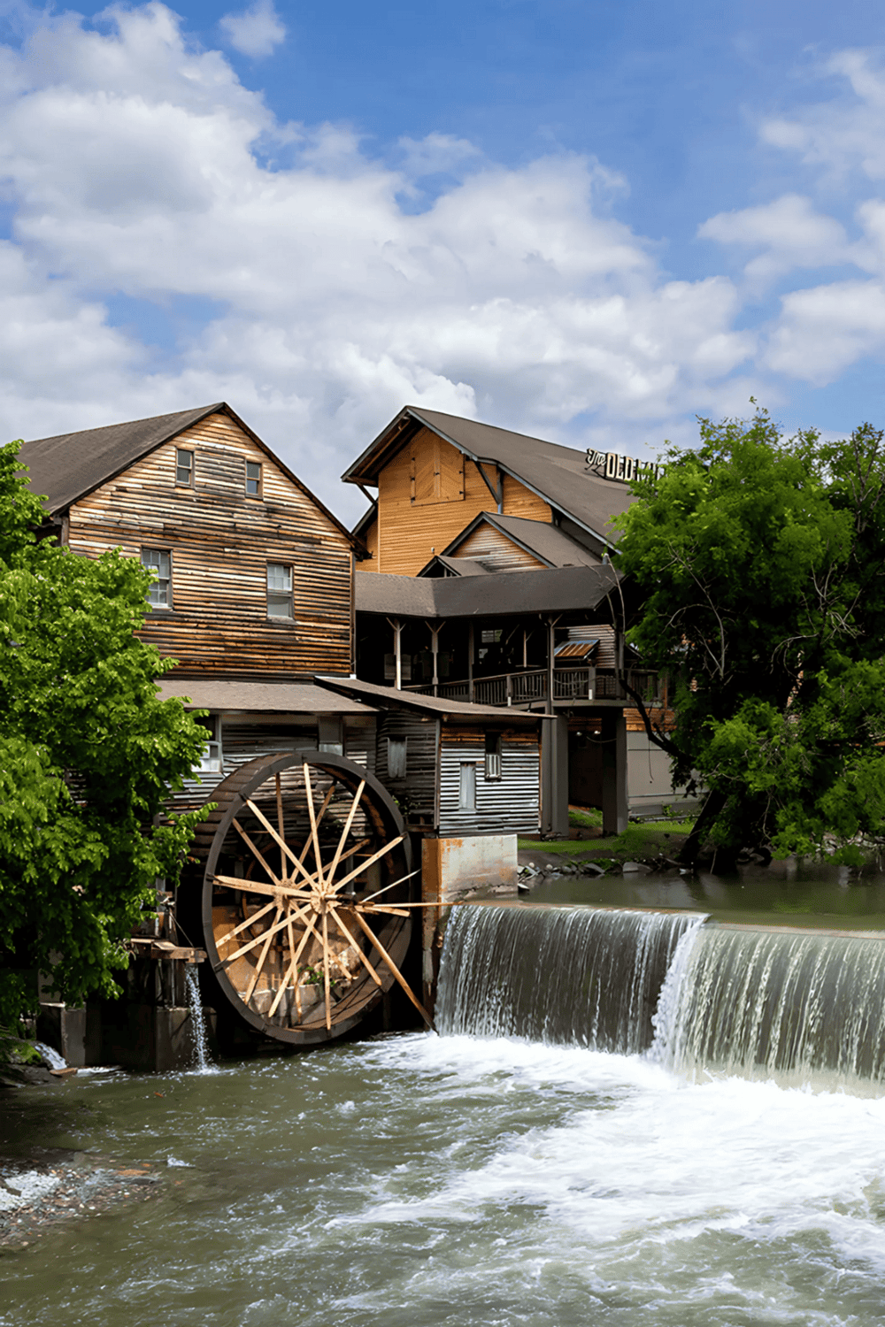 Water Mill Historical Site along river in historic town.