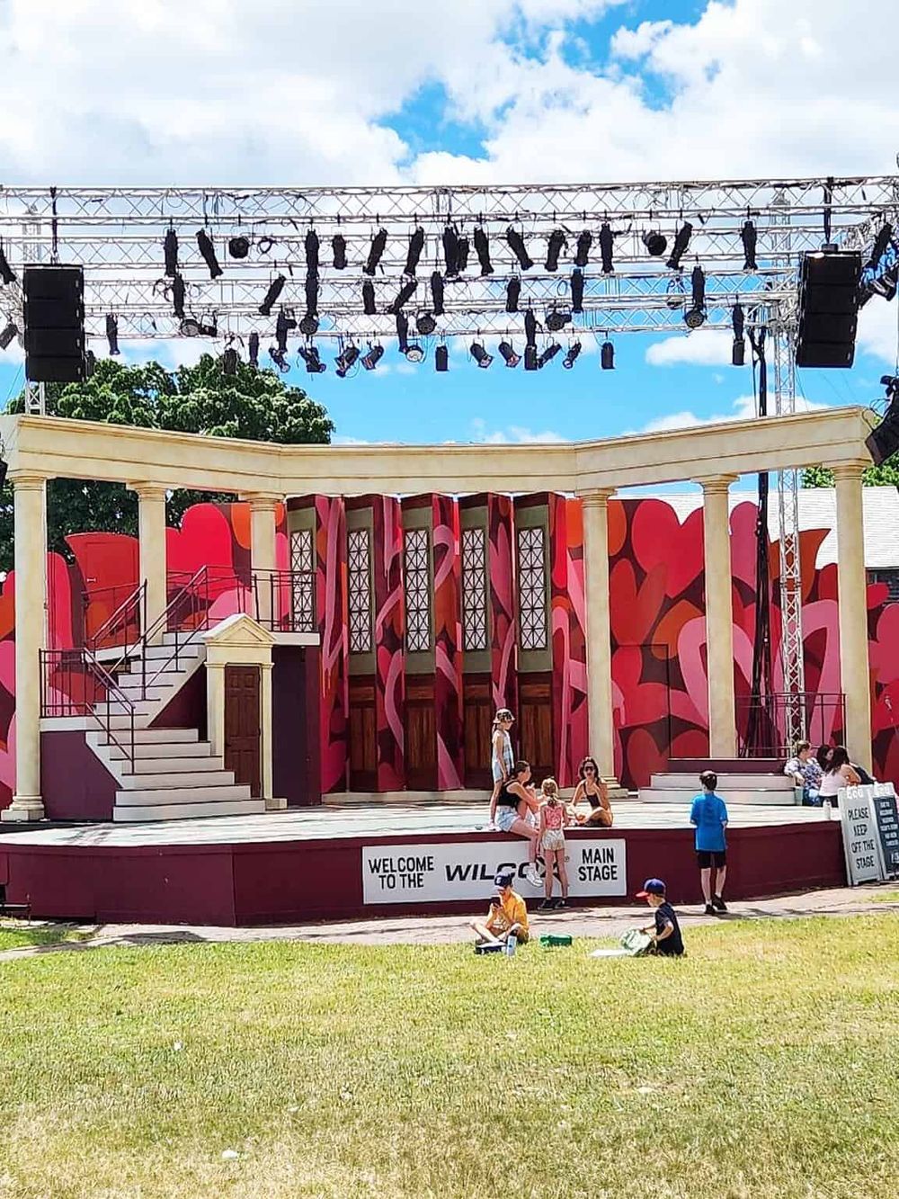 Colorful outdoor stage with theater and lighting setup for events and performances.