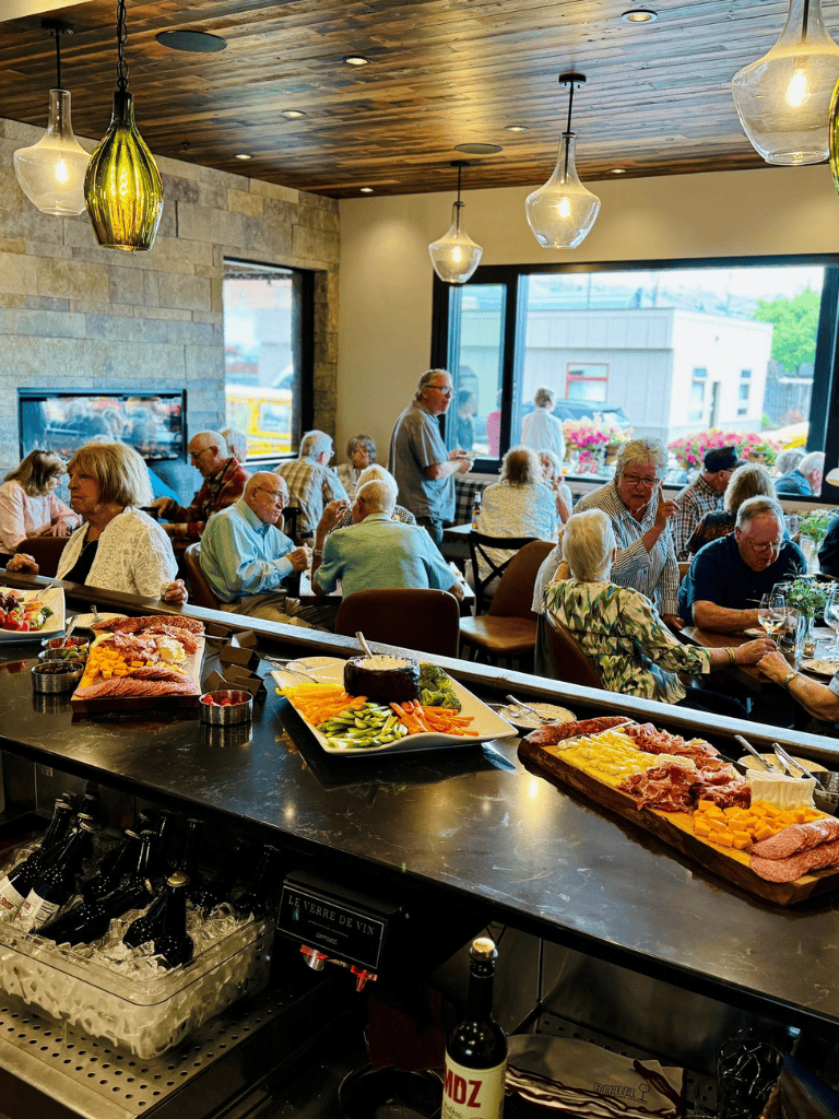 All you need to know about Quest for Directions, restaurant interior, elderly diners, buffet setup, food presentation, cozy ambiance, community dining, senior-friendly dining experience, and inviting restaurant atmosphere.