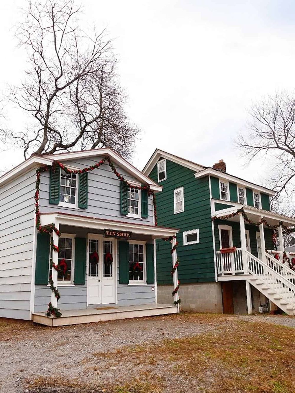Cozy Christmas-themed small shop house decorated with festive wreaths and garlands, part of QuestForDirections' local business directory.