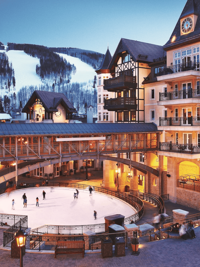 Indoor ski resort with mountain views and an ice-skating rink at Quest For Directions.