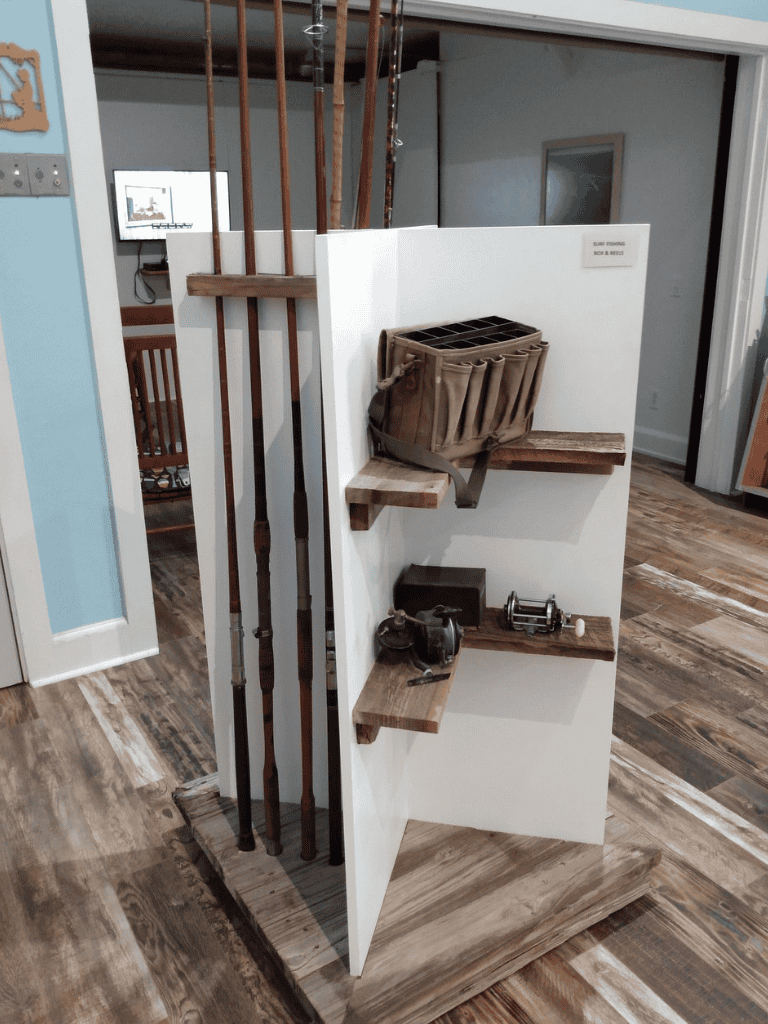 Fishing gear organization display at QuestForDirections Marine Shop.