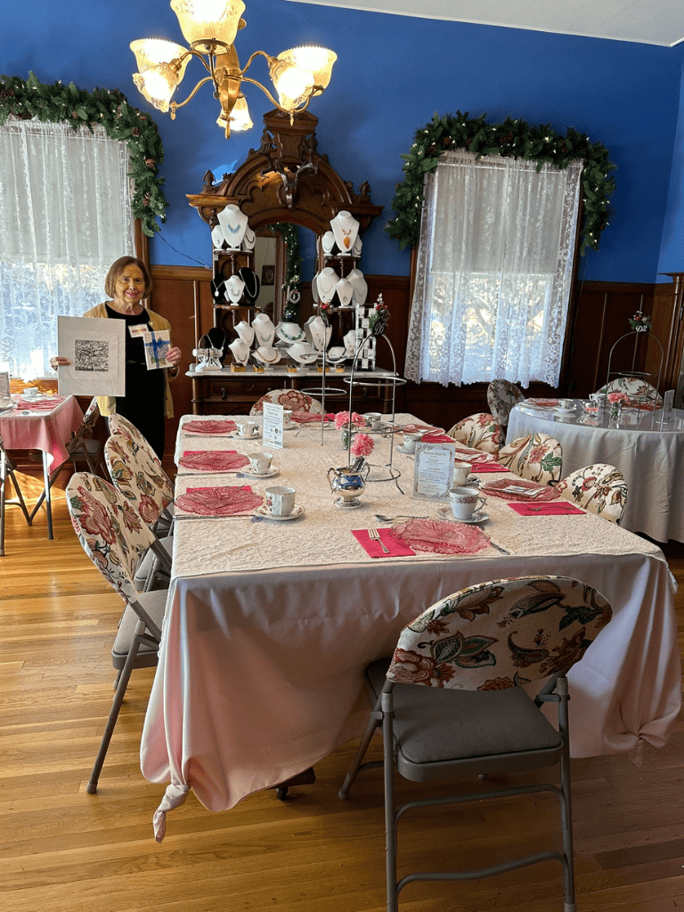 Elegant jewelry display at QuestForDirections event center, beautifully decorated dining space with floral accents.