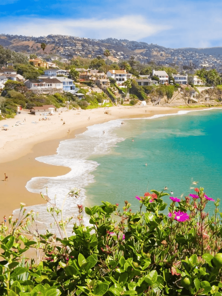 Stunning coastal view of homes and beach along the California shoreline.