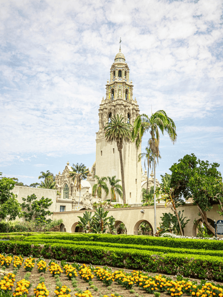 Historic San Diego Tower with lush gardens, perfect for travel inspiration and sightseeing.