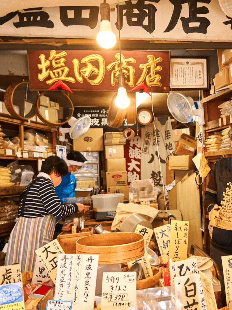 Traditional Japanese shop interior with various beans and products display.
